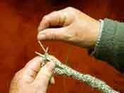 The slow and tedious way to knit, taking the hand off the needle for every stitch