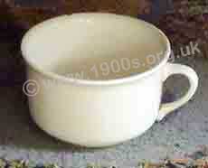 basic china chamber pot for adult use, common in the early 1900s when there were no indoor lavatories.