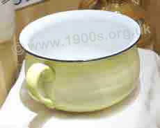 basic enamel chamber pot for adult use, common in the early 1900s when there were no indoor lavatories.