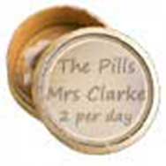 chemist pills dispensed in carboard pillbox