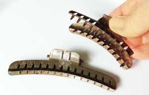 Old hair clamps for setting hair for for Marcel waving at home