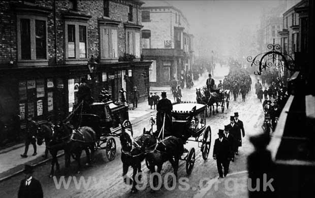 Victorian or Edwardian funeral procession with mourners 2 of 2