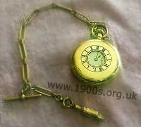half-hunter pocket watch with chain and fob
