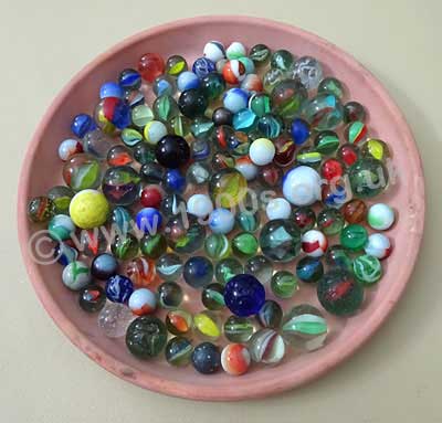 Marble collection showing the different sizes, colours and twists in the marbles