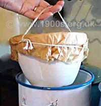 Pudding prepared for steaming as in the early 1900s.