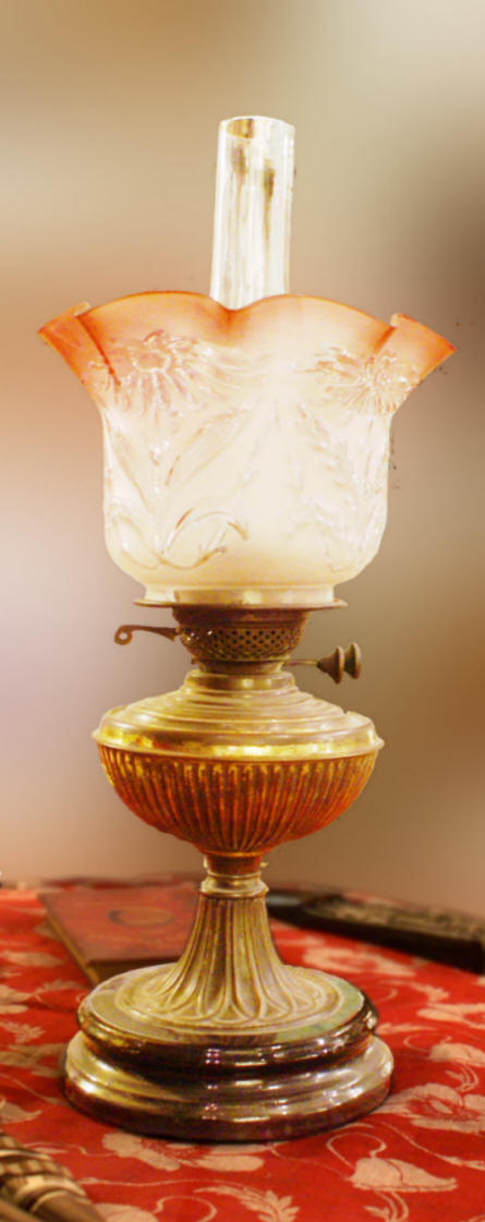Old Victorian decorated brass oil lamp of superior quality with a pink embossed frosted glass 'shell' shade.