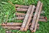 Old sash window weights, tied together in pairs of equal weights