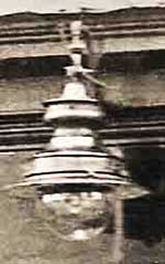 Gas lamp above the display window of an early 1900s drapers/haberdashers