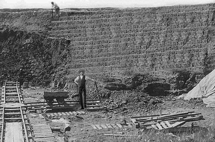 clay pit showning the steps as the clay is dug out