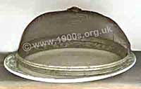 Old food cover against flies, made of metal mesh